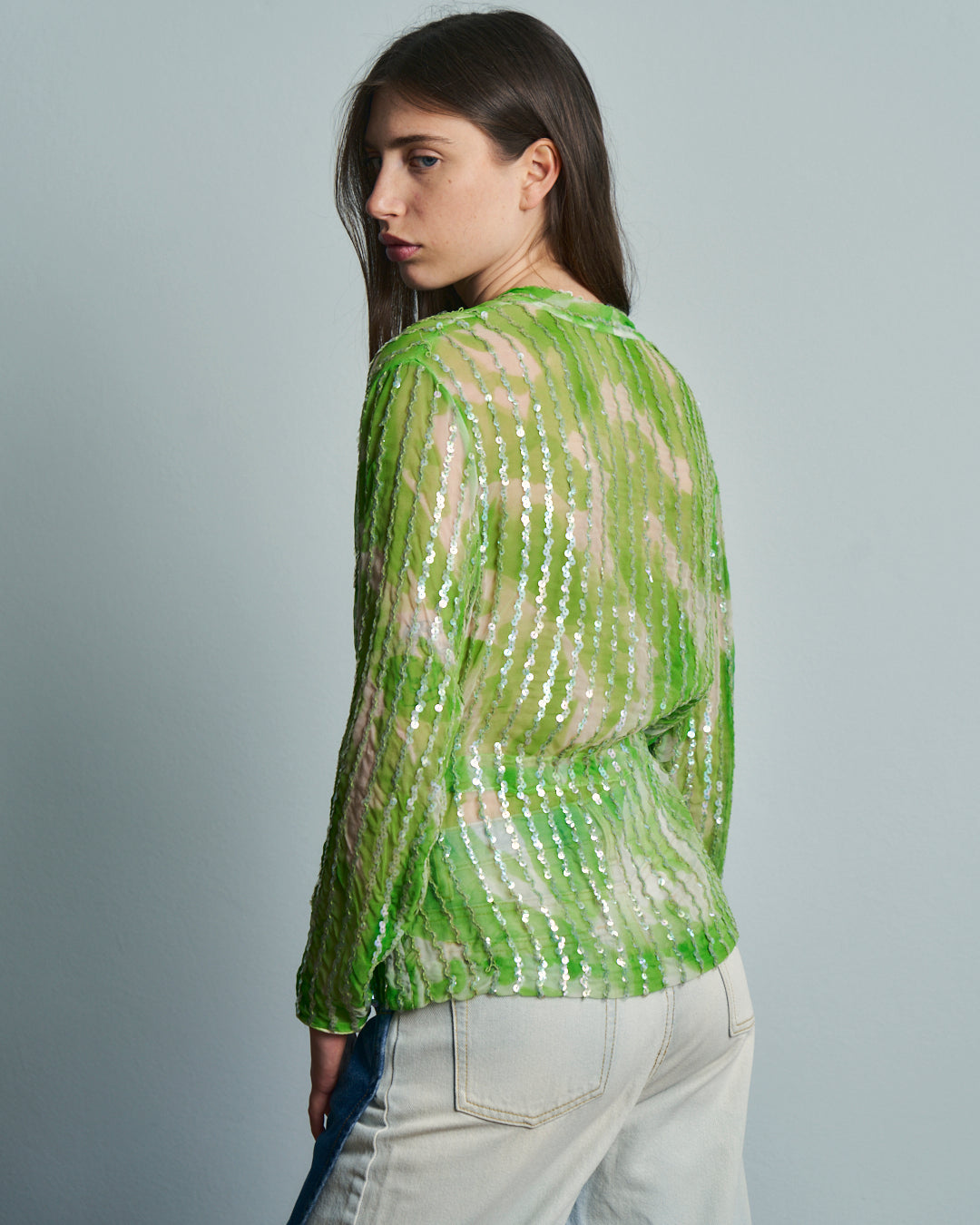 Blusa in crepe trasparente con paillettes e coulisse
