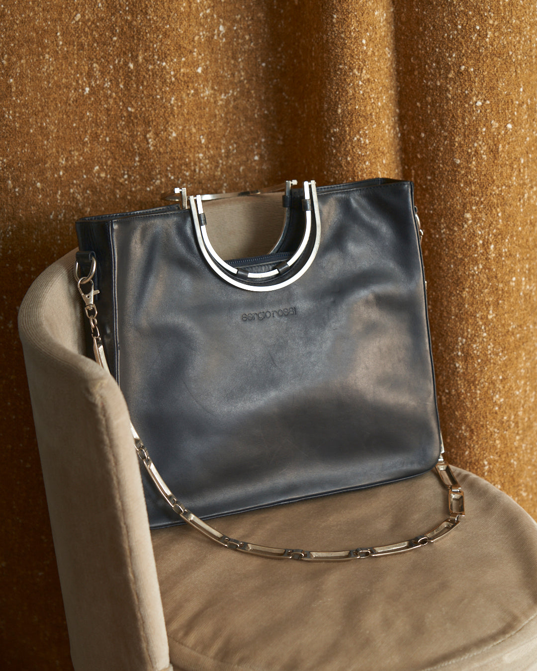 Borsa Sergio Rossi in pelle con catena e trims galvanica argento