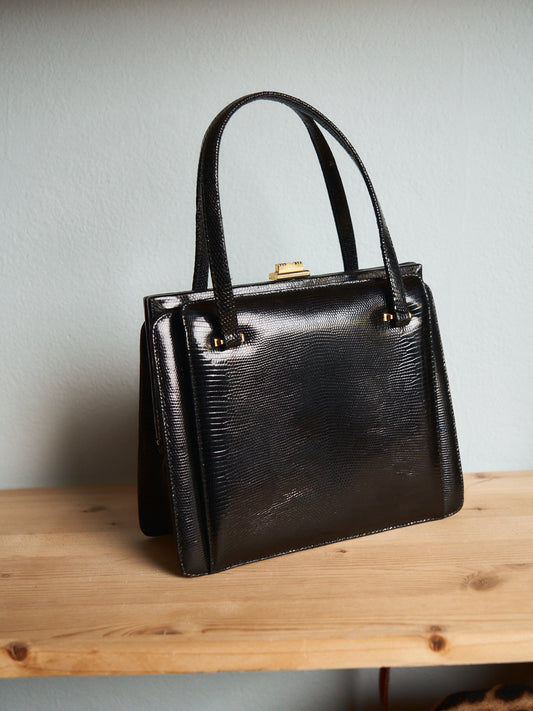 Borsa anni 60 in lucertola lucida nera