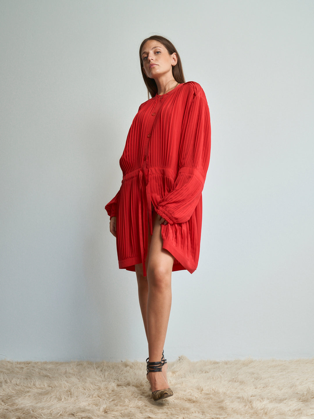Giacca in tessuto plissettato con coulisse in vita girocollo