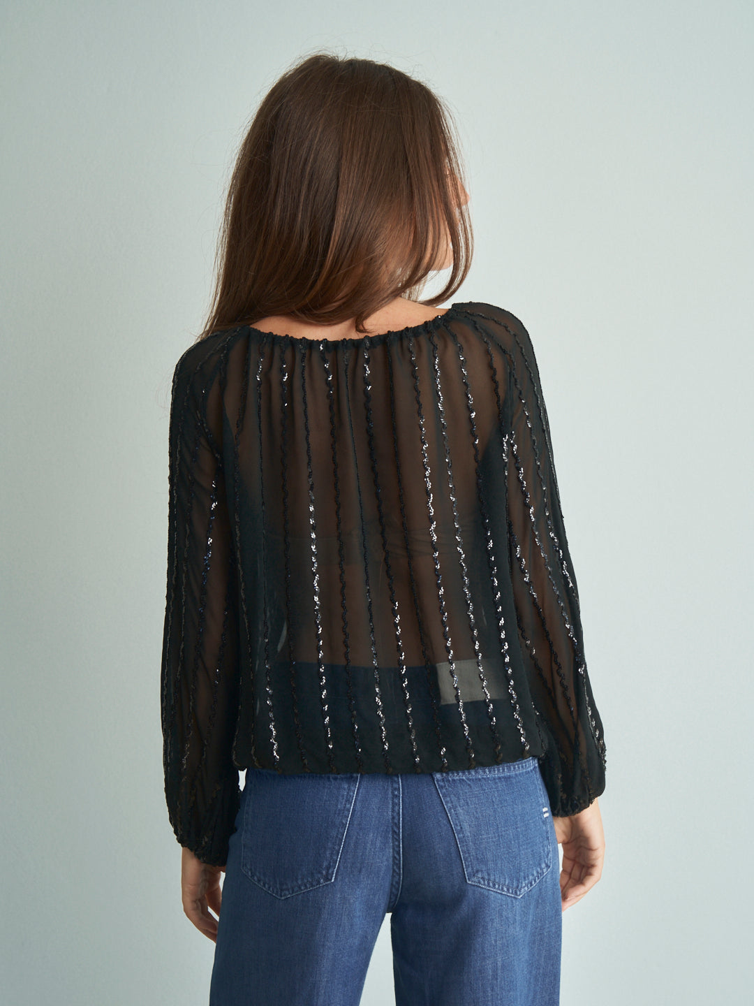 Blusa anni 70 con paillettes e nappe