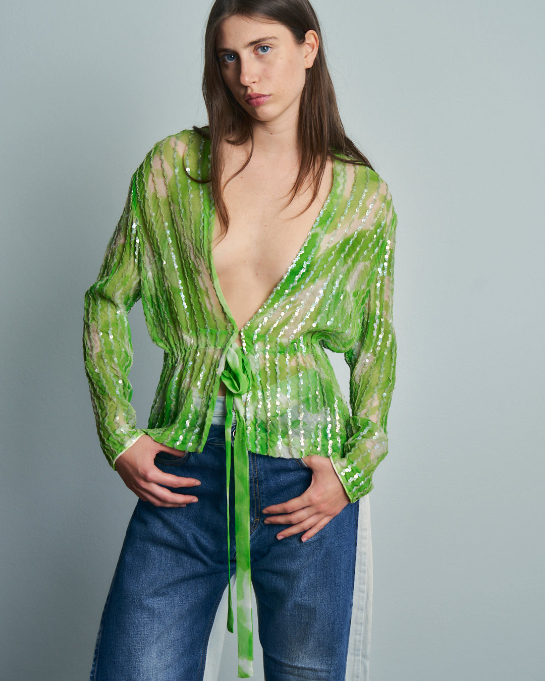 Blusa in crepe trasparente con paillettes e coulisse