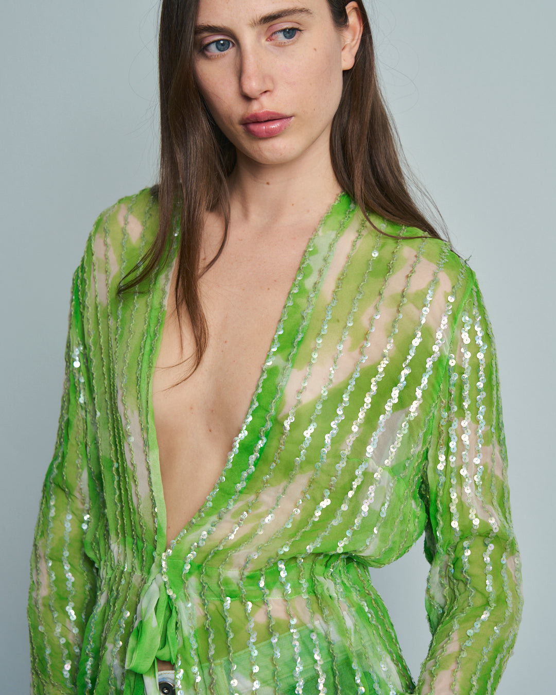 Blusa in crepe trasparente con paillettes e coulisse
