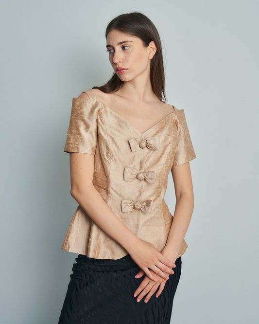 Blusa anni 80 in seta champagne con fiocchi