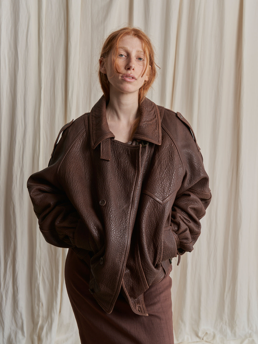 Bomber in pelle marrone made in Italy anni 80 over con fibbie