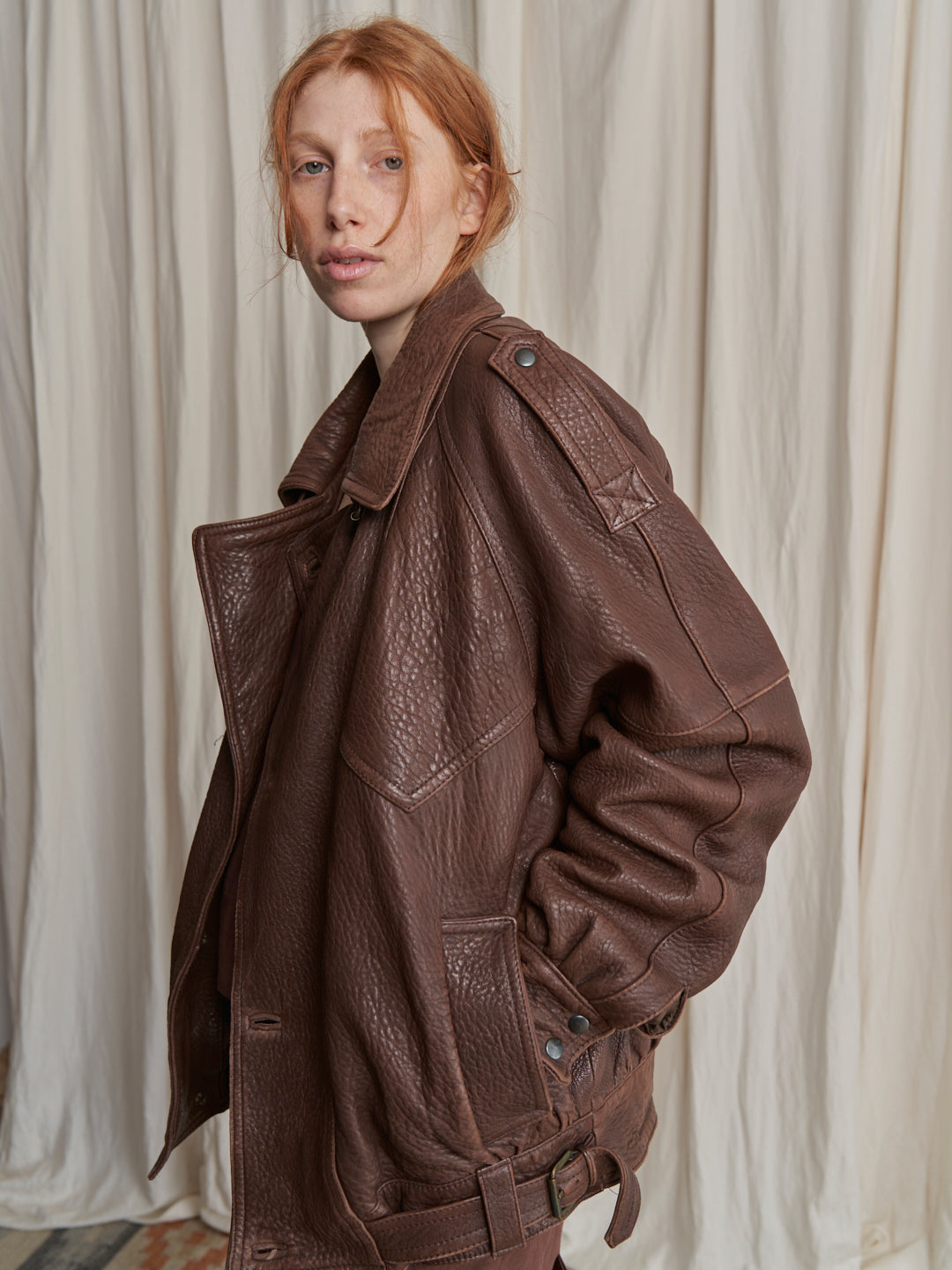 Bomber in pelle marrone made in Italy anni 80 over con fibbie