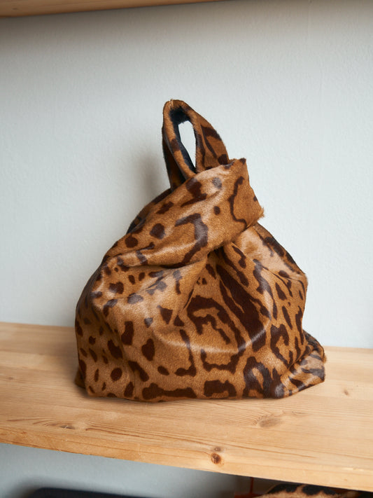 Borsa a sacchetto in pelle di cavallino maculato