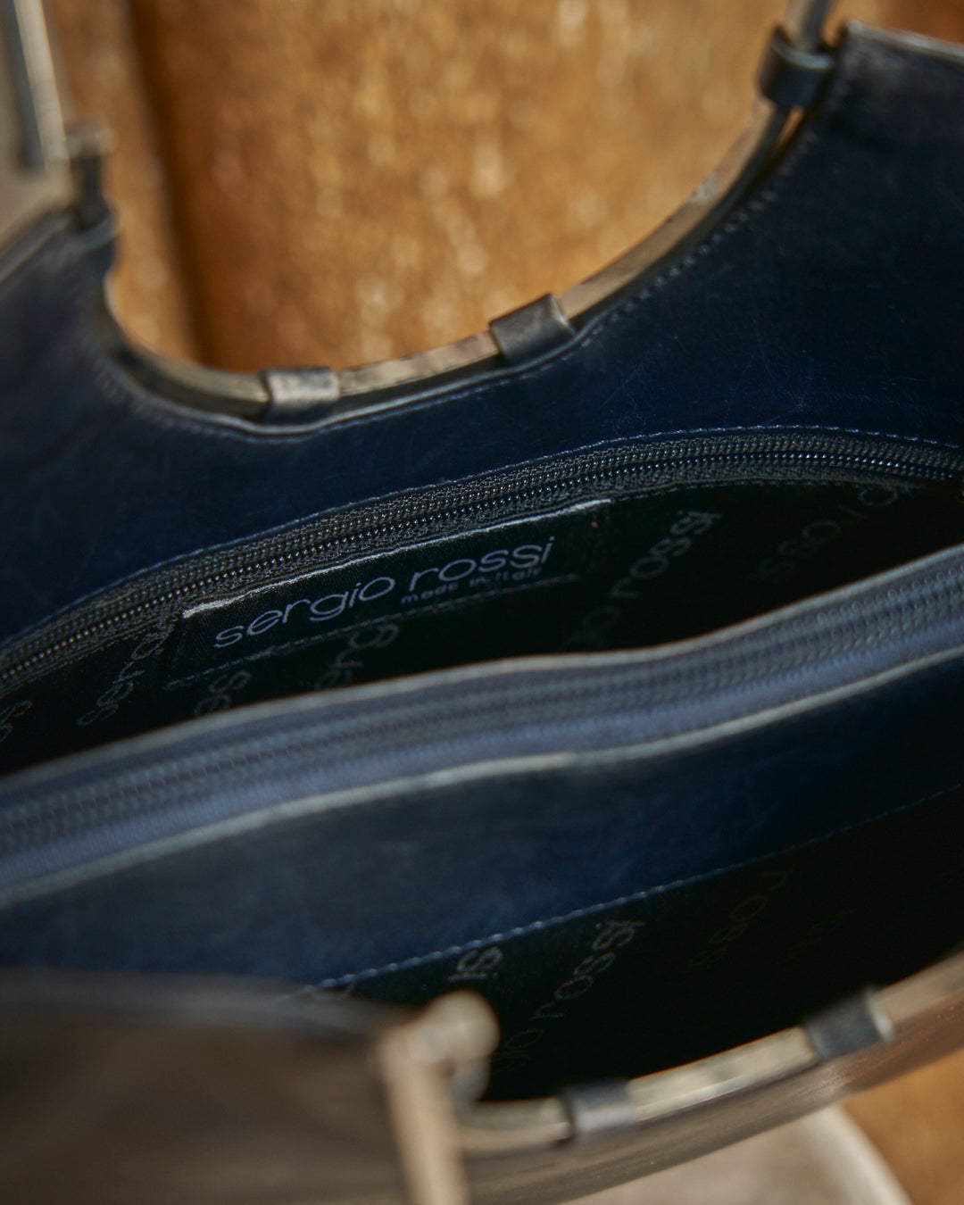 Borsa Sergio Rossi in pelle con catena e trims galvanica argento