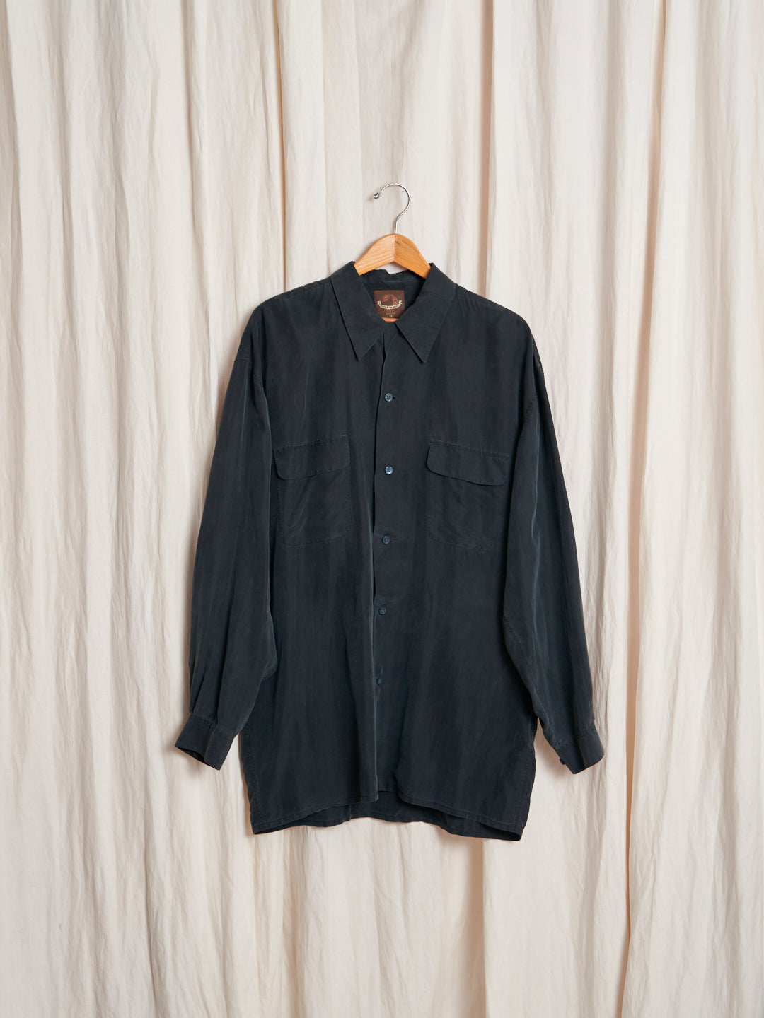 Camicia in seta pura effetto lavato mano pesca.