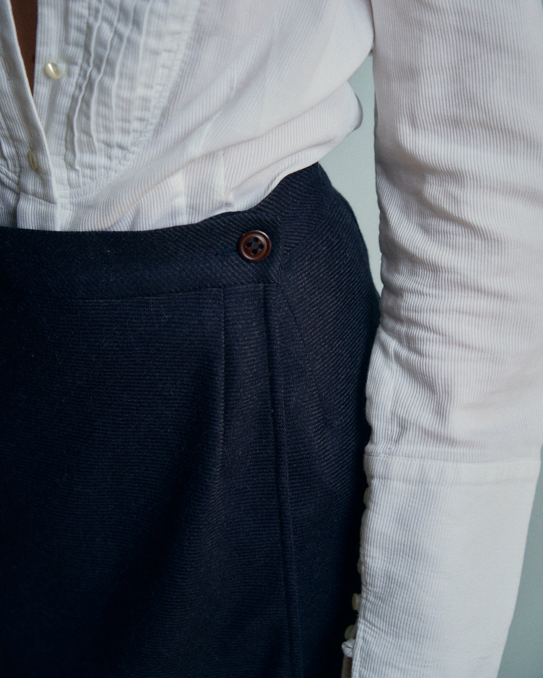 Gonna Erreuno in lana spinata con frange asimmetrica