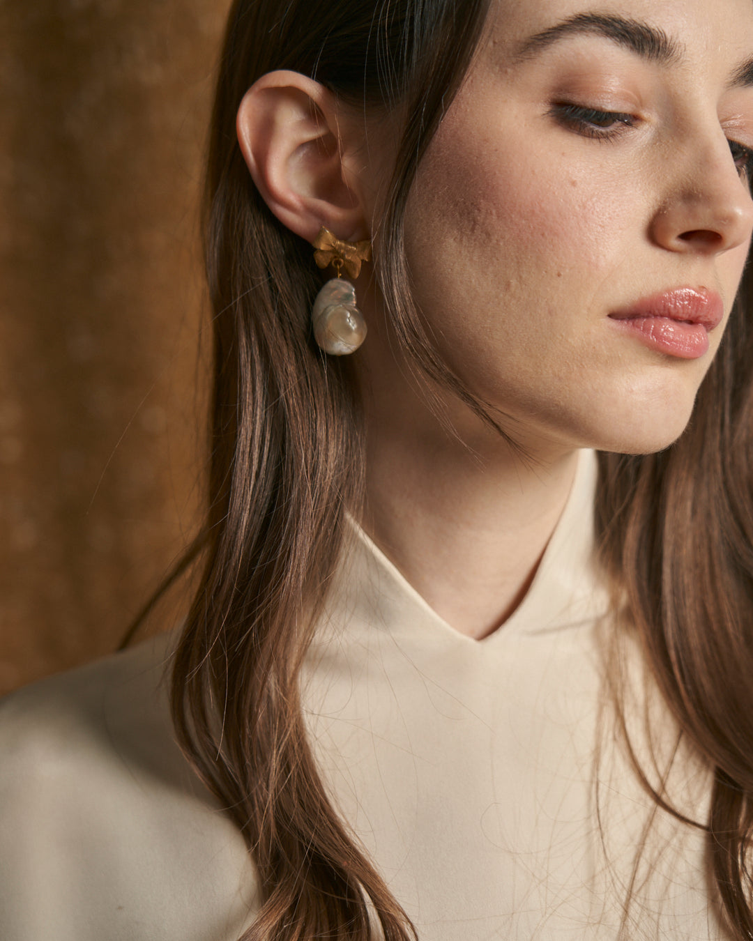 Orecchini fiocco pendenti madreperla