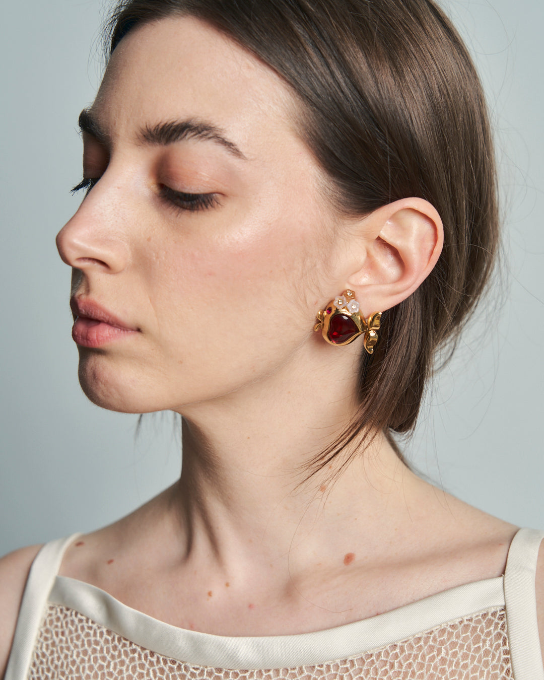 Orecchini dorati pesce cuore