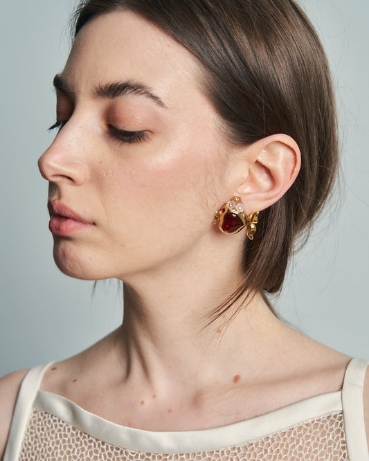 Orecchini dorati pesce cuore
