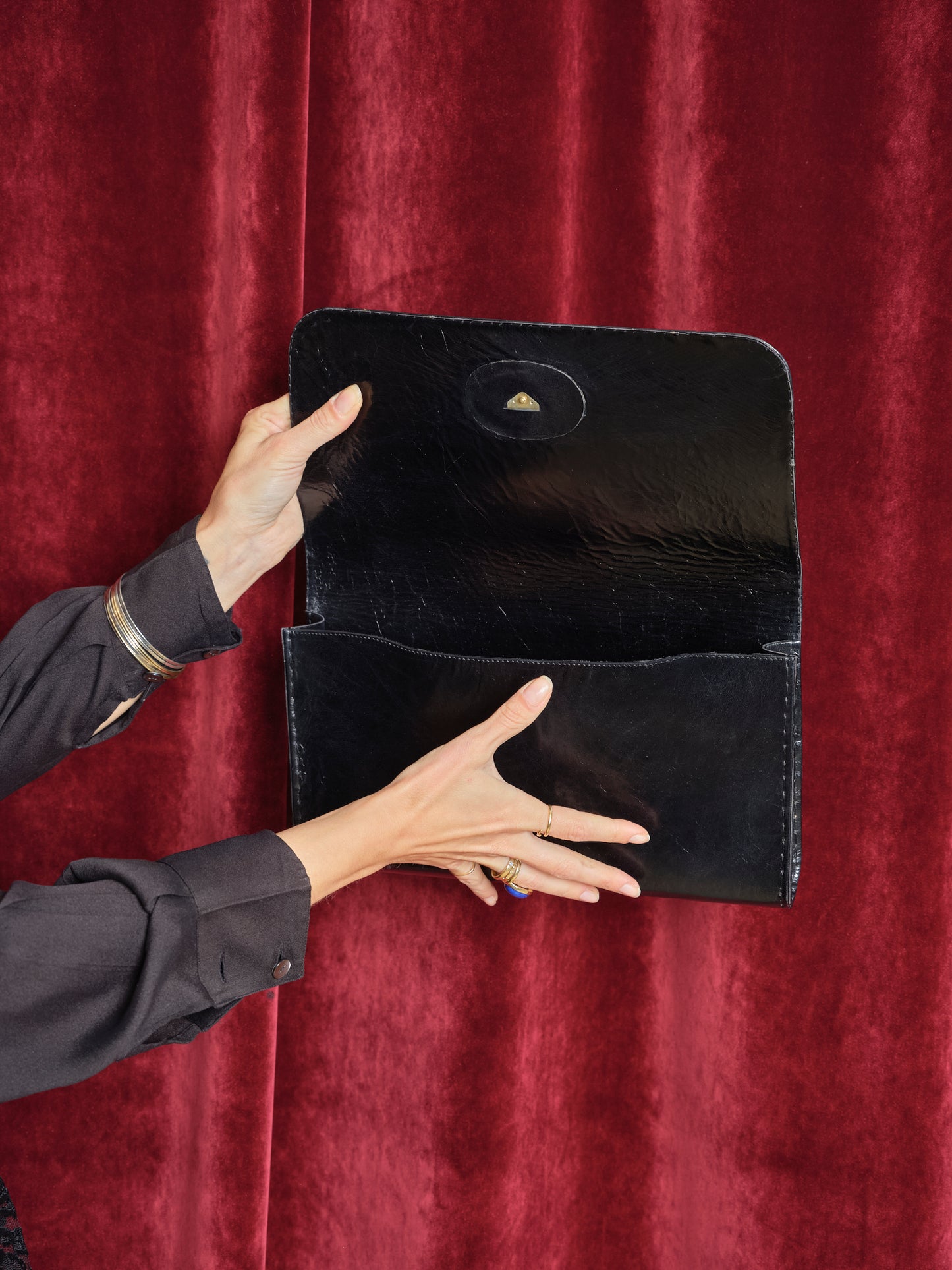 Pochette a busta in pelle