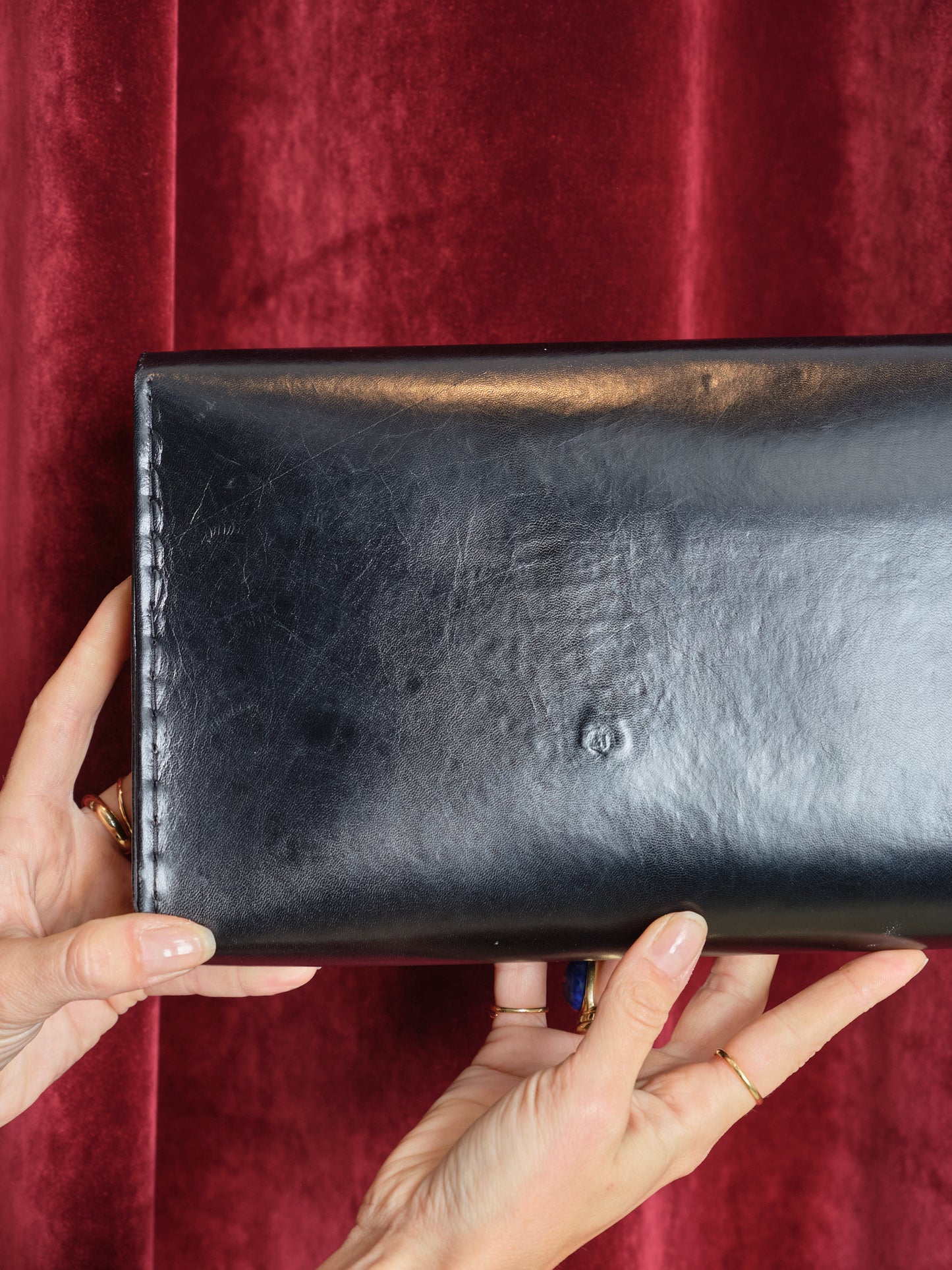 Pochette a busta in pelle