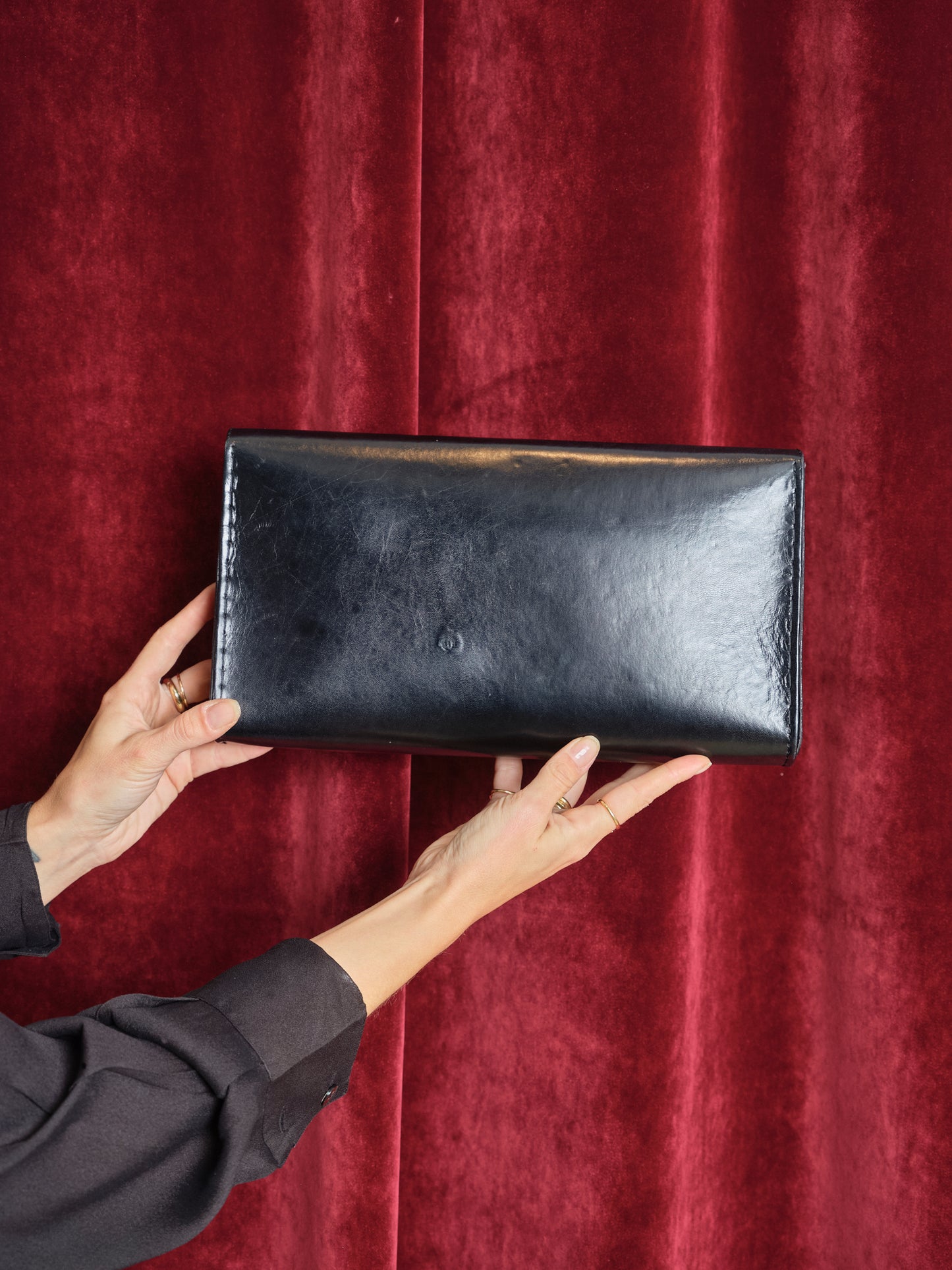Pochette a busta in pelle